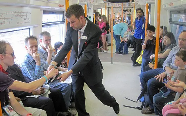 magician-on-train