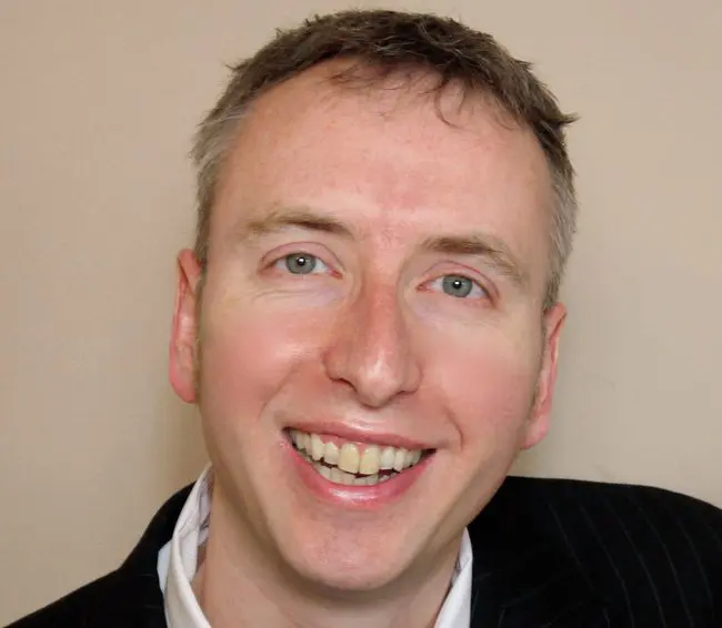 Simon-Horton-headshot-in-suit_hires
