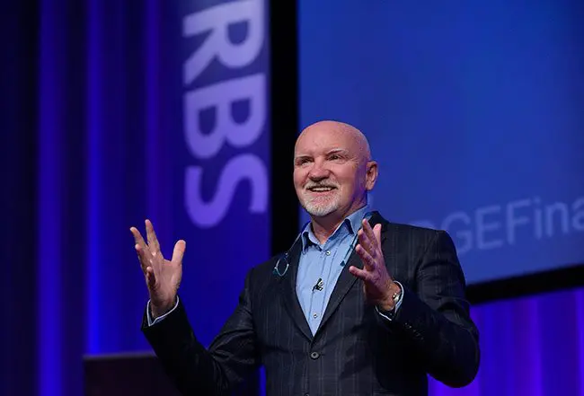 Sir-Tom-Hunter-addresses-the-audience-of-300