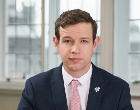 Callum-McCaig-in-Parliament-e1472203667536-472×372