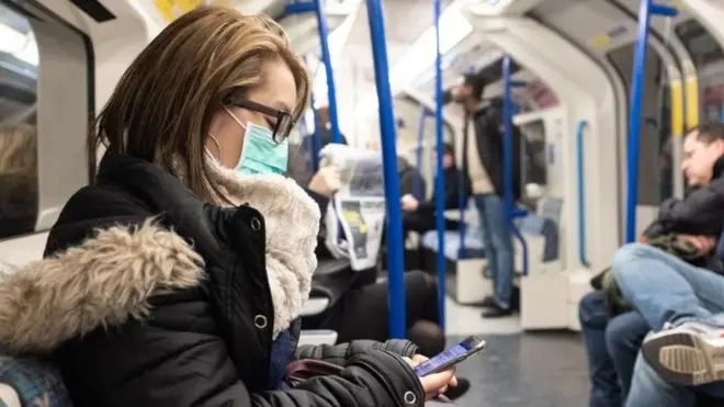 mask on tube train