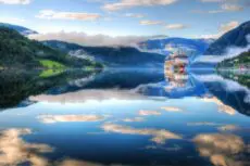 Imagine a holiday where breathtaking scenery, dramatic coastlines, and timeless traditions come together in perfect harmony. Few destinations bring this vision to life like the Norwegian Fjords.