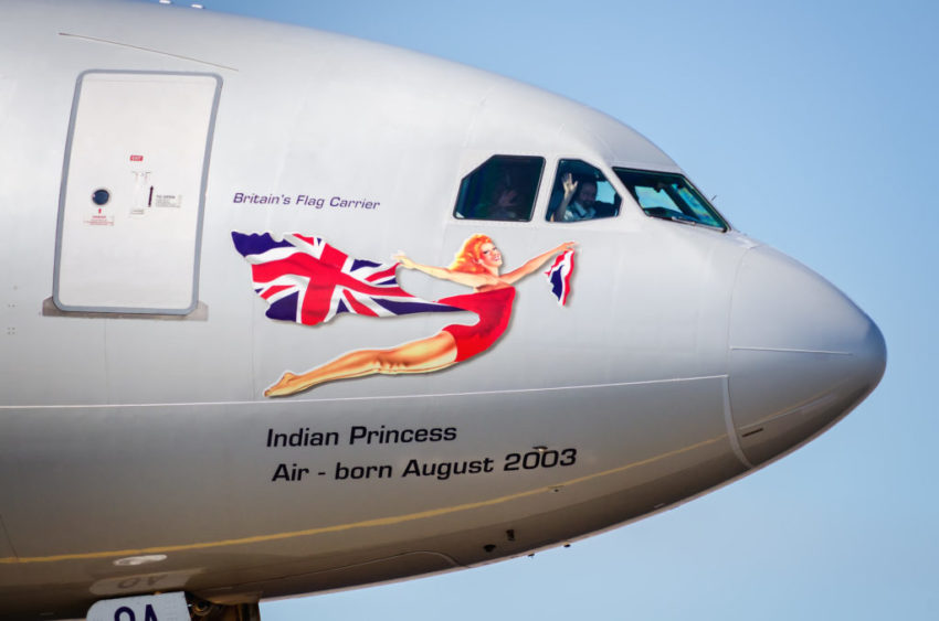 Pilot of the plain waving his hand