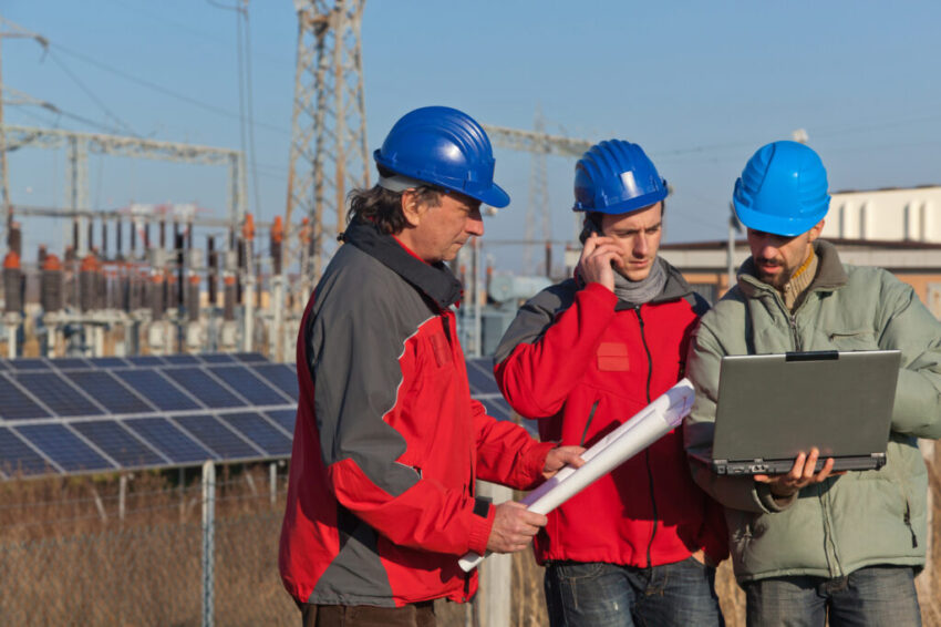 Engineers at Work In a Solar Power Station
