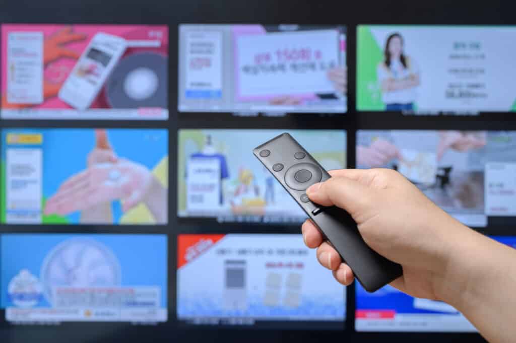 Someone,Who,Searches,Tv,Home,Shopping,Channels,With,A,Remote