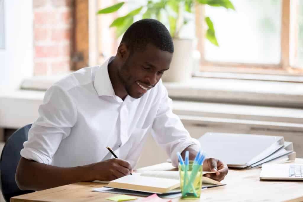 Smiling,African,Student,Do,Easy,Exercise,Homework,Assignment,Preparing,For