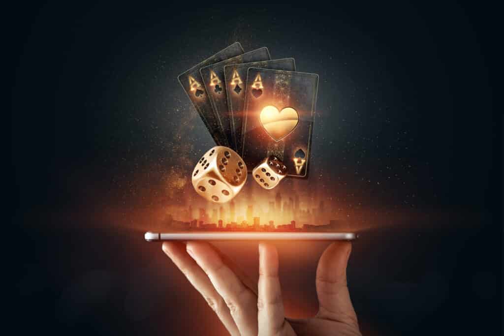Creative,Background,,Online,Casino,,In,A,Man’s,Hand,A,Smartphone