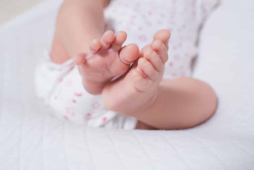 Little,Foot,Of,A,Cute,,Adorable,Newborn,Girl