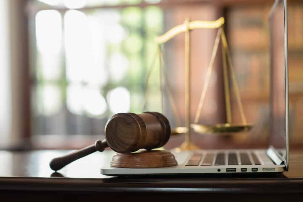 Law,Legal,Technology,Concept.,Judge,Gavel,On,Computer,With,Scales