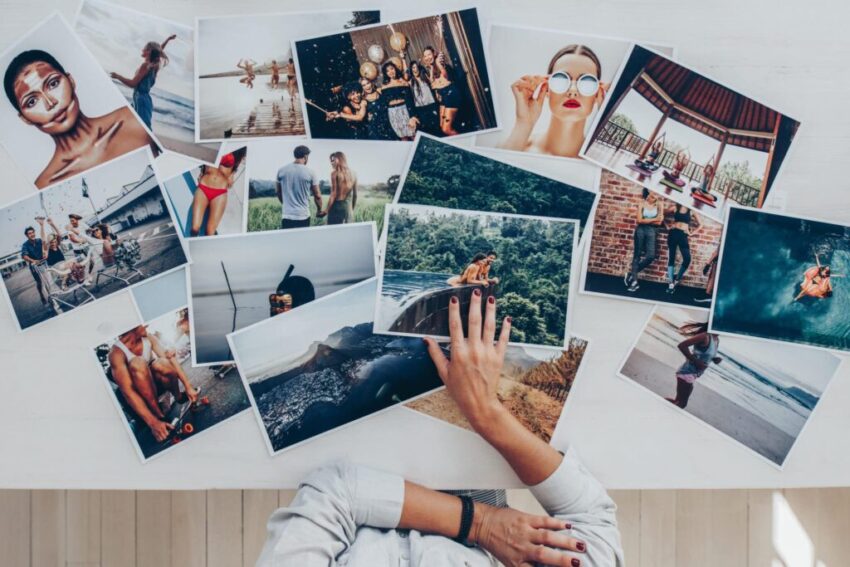 Top,View,Of,A,Photographer,Selecting,Best,Photos,From,Several