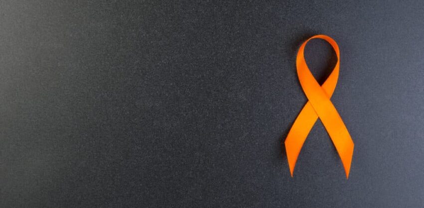 Orange,Ribbon,On,Black,Background.,Concept,Kidney,Cancer,(copd),And