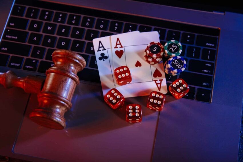 Law,For,Online,Casino.,Wooden,Judge,Gavel,And,Aces,With