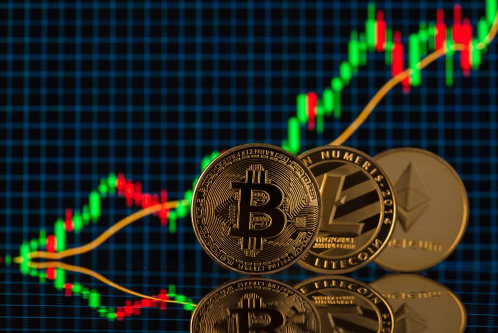 Close,Up,Photo,Of,Bitcoin,Litecoin,And,Etherium,Cryptocurrency,Standing