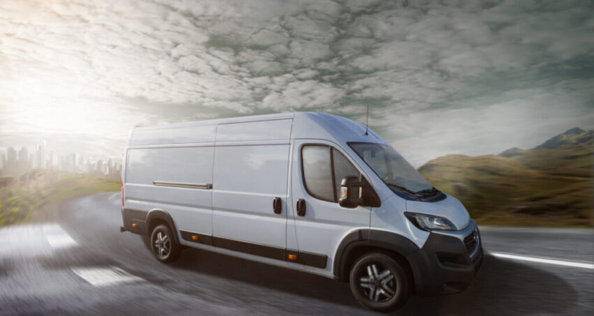 Delivery,Truck,Drives,On,A,Road