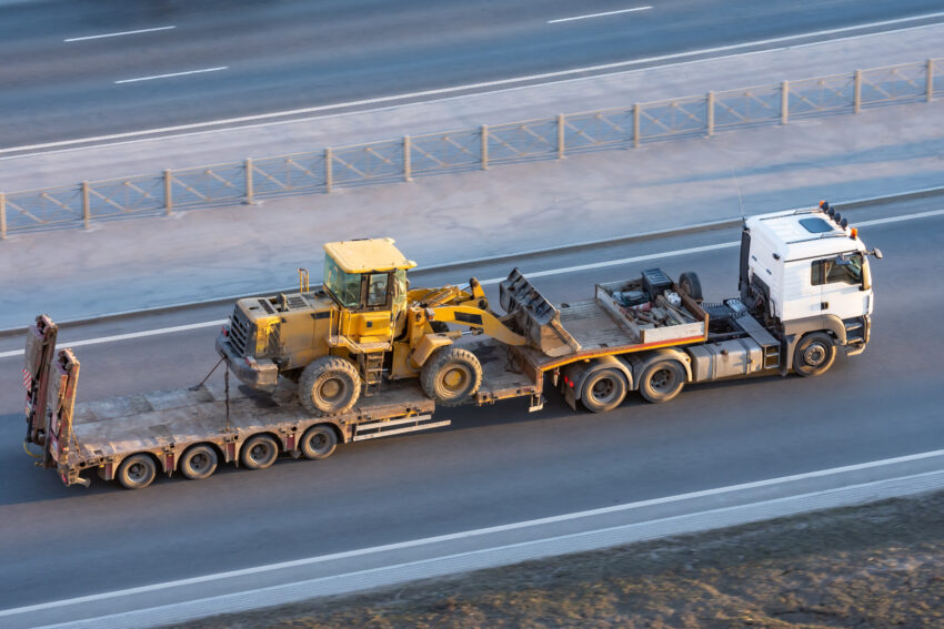 Truck,With,A,Long,Trailer,Platform,For,Transporting,Heavy,Machinery,