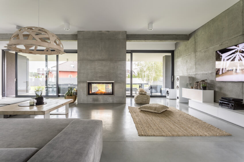 Spacious,Villa,Interior,With,Cement,Wall,Effect,,Fireplace,And,Tv