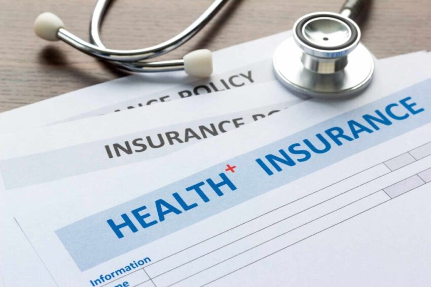 Health,Insurance,Form,With,Stethoscope,In,Top,View