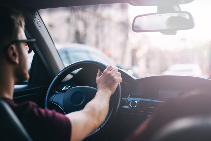 Young,Man,Driving,A,Business,Car.,Trip,Of,A,Businessman