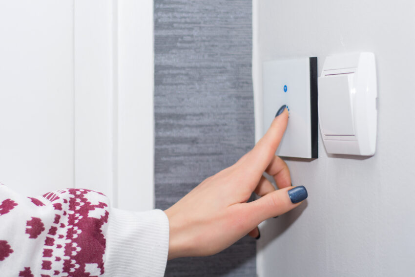Girl,Hand,Turn,Off,Light,On,Smart,Touch,Switch.,Modern