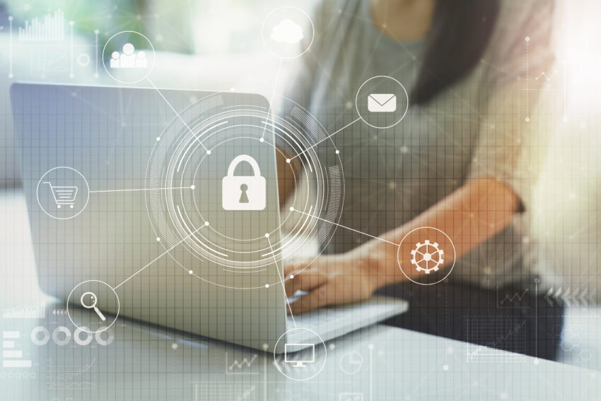 Cyber,Security,With,Woman,Using,Her,Laptop,In,A,Living