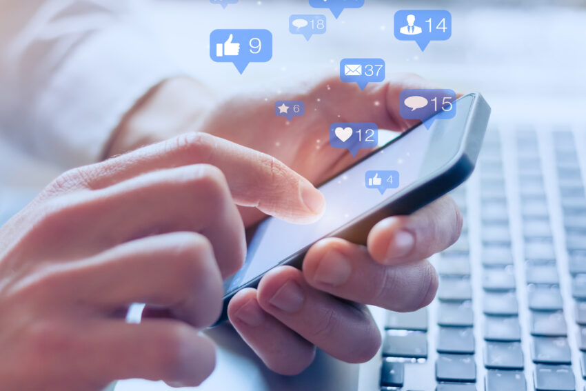 Social,Media,Interactions,On,Mobile,Phone,,Concept,With,Notification,Icons