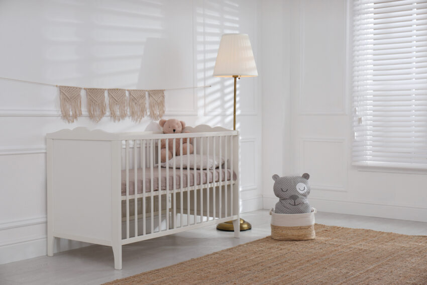 Cute,Baby,Room,Interior,With,Comfortable,Crib,And,Teddy,Bear