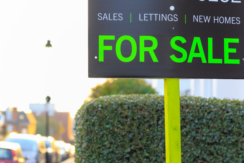 Britain’s housing market is to slow dramatically in 2022 as borrowing costs rise and household budgets come under mounting strain, property experts have predicted.