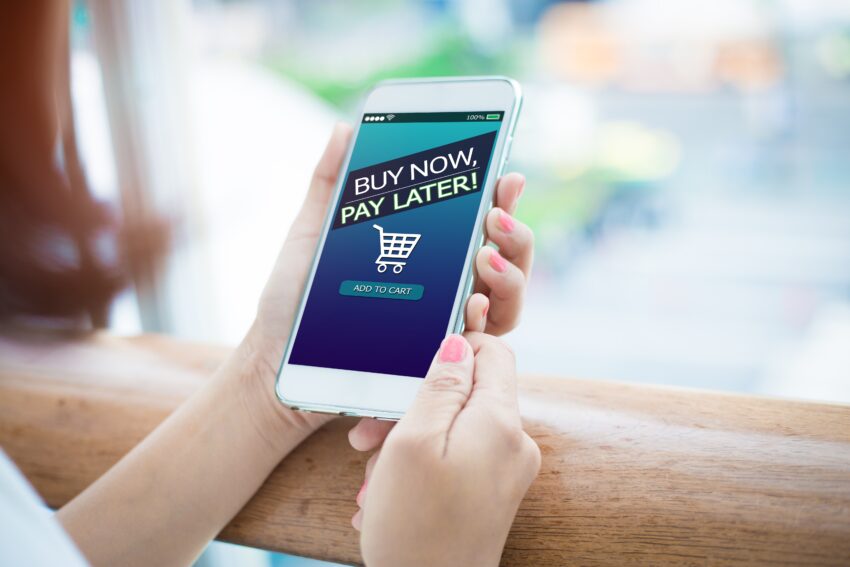 Bnpl,Buy,Now,Pay,Later,Online,Shopping,Concept.hands,Holding,Mobile