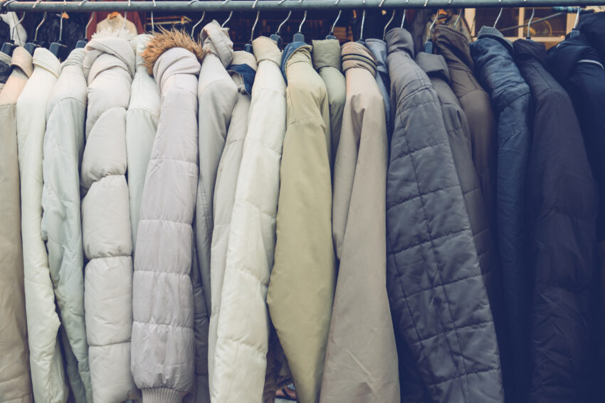 Fashion,Winter,Coats,Hanged,On,A,Clothes,Rack.