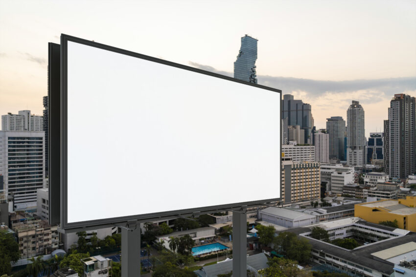 Blank,White,Road,Billboard,With,Bangkok,Cityscape,Background,At,Sunset.