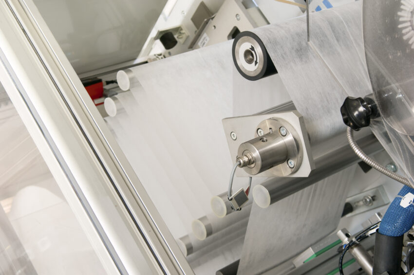Equipment,And,Mechanism,With,A,Moving,Cloth,Tape,On,Rollers