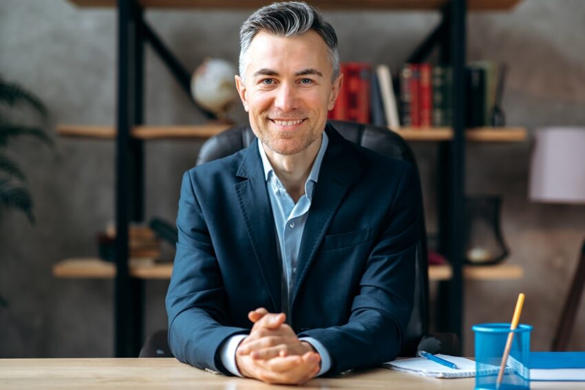 business man caucasian successful online mature busy confident