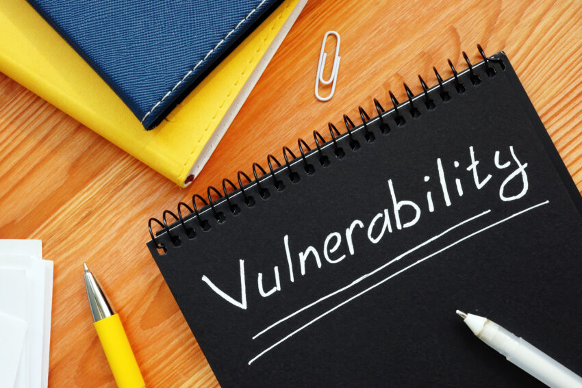 Vulnerability,Is,Written,In,White,Pencil,On,A,Black,Page.