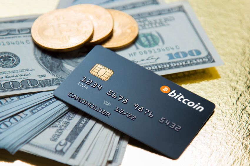 Concept,Bank,Card,Bitcoin,On,A,Golden,Background