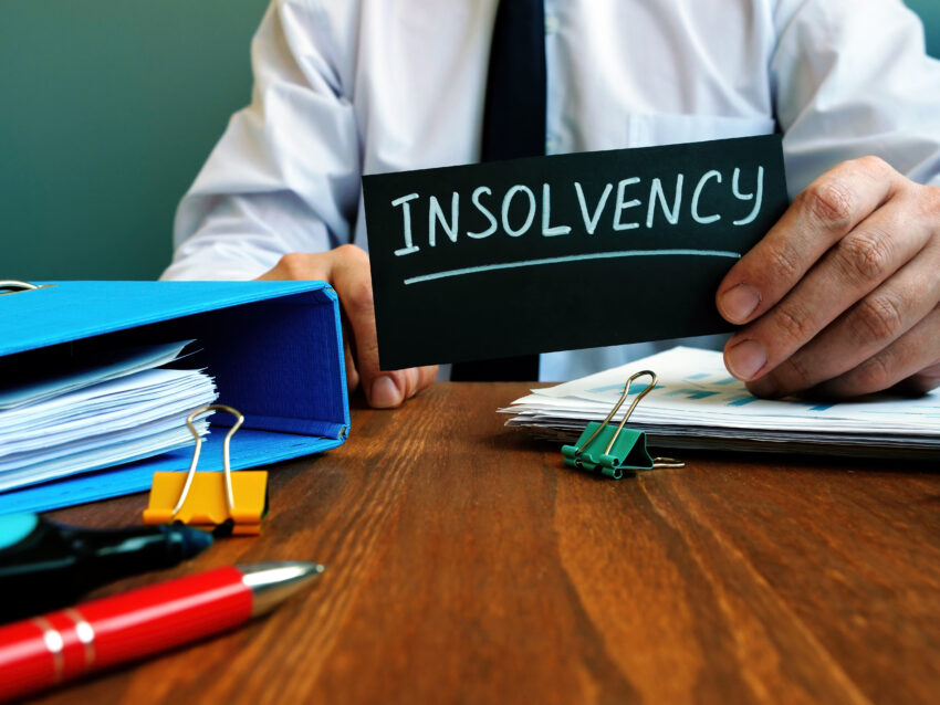 Man,Holds,Sign,Insolvency,About,Company,Bankruptcy.