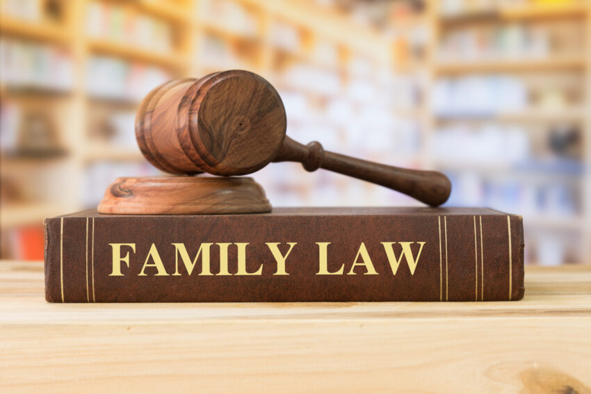 Family,Law,Books,With,A,Judges,Gavel,On,Desk,In