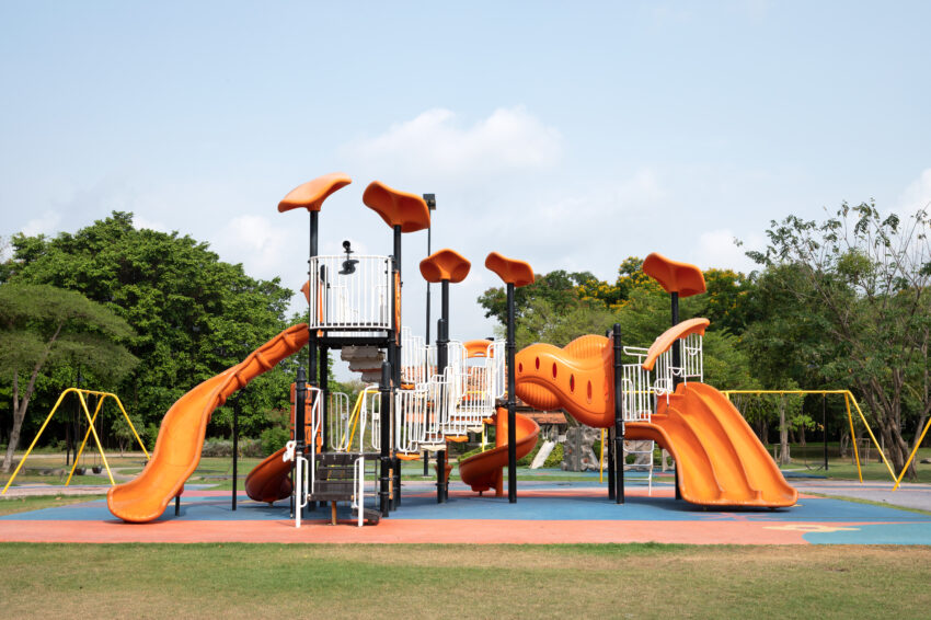 The,Outdoor,Playground,In,The,Daytime,Has,A,Backdrop,Of